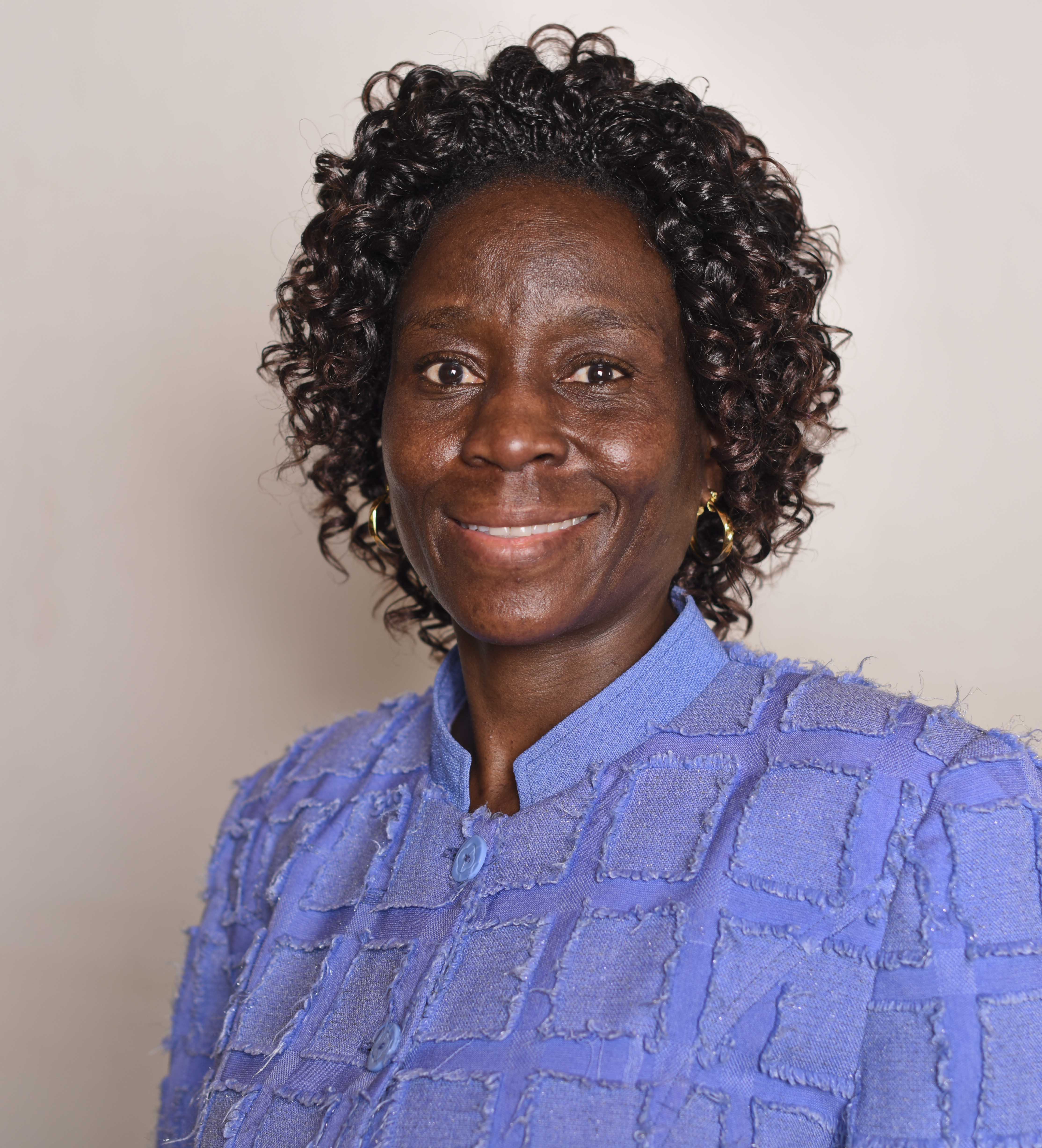 Ms. Carolyne M. Imbayi