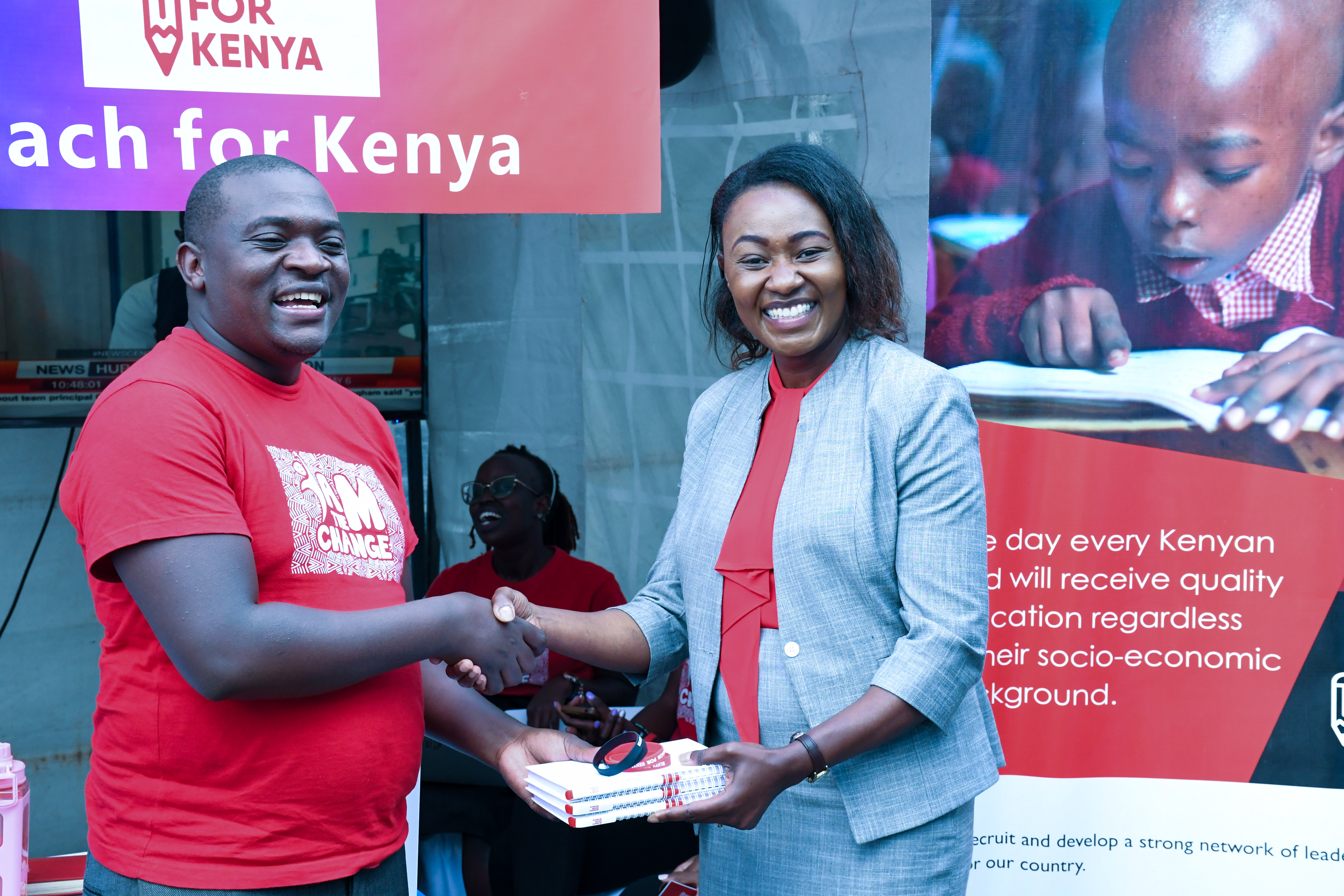 Madam Naom Nyaboga Receiving a gift from one of our partners